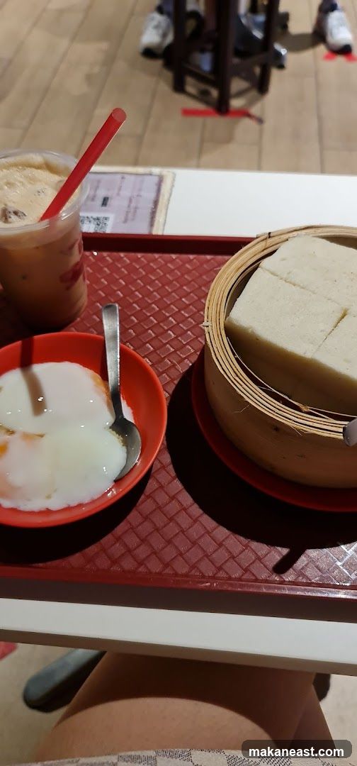 Soft-boiled eggs, toast, and iced coffee