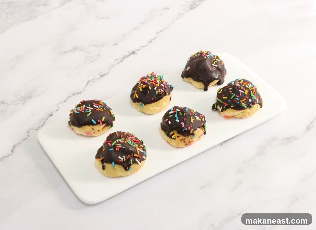Chocolate Frosted Pastries with Sprinkles