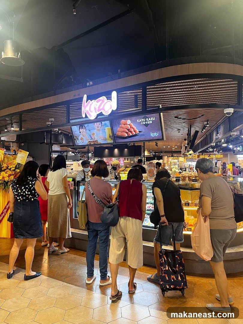 People queuing at a food stall