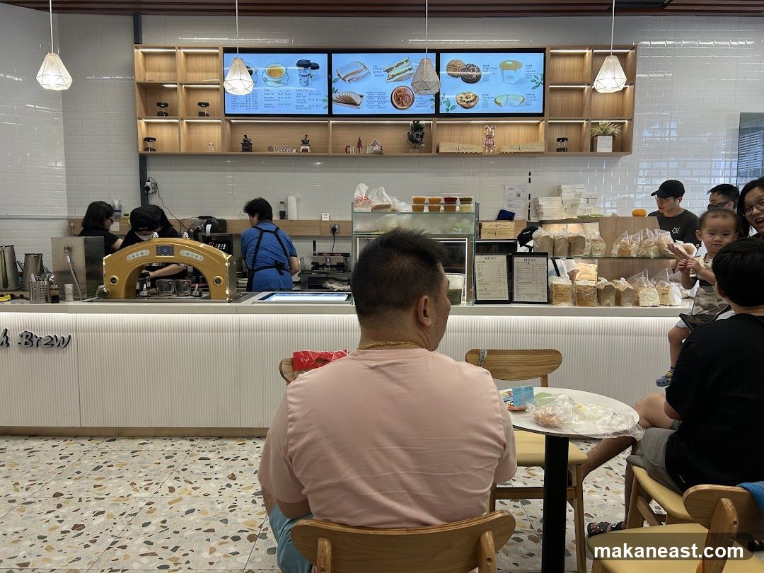Cafe Interior with Customers and Staff