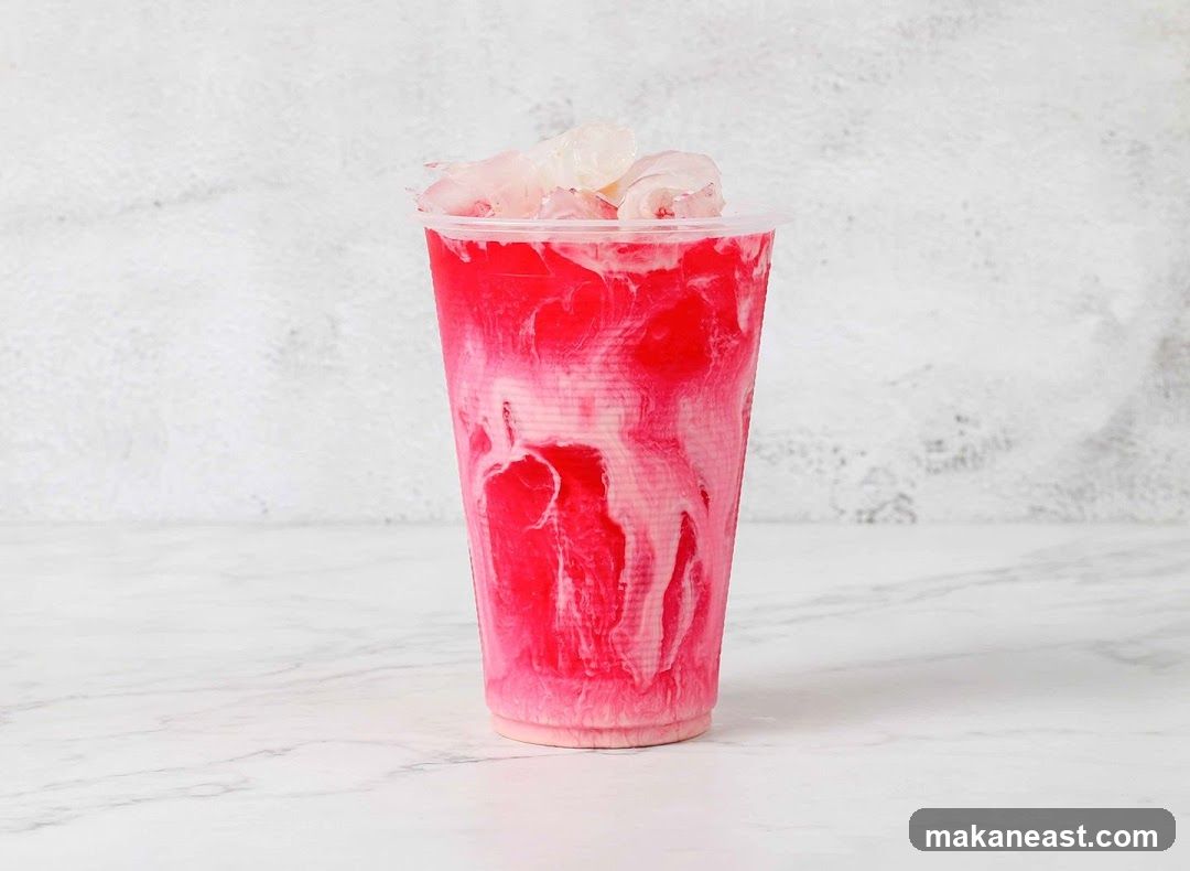 Pink and White Swirled Drink with Ice