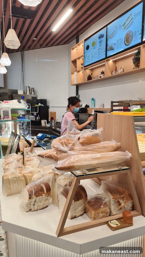 Bakery Counter with Bread and Menu Boards