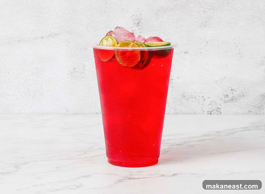 Red Drink with Lime and Ice