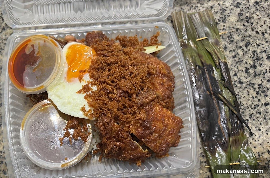 Nasi Lemak with Fried Chicken and Otak-Otak