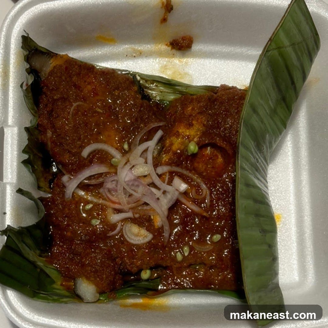 Fish dish with sauce and onions