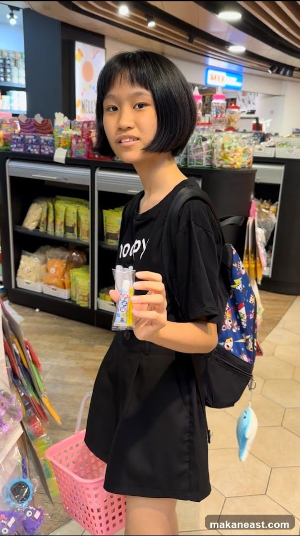 Girl holding a travel-sized toiletries kit