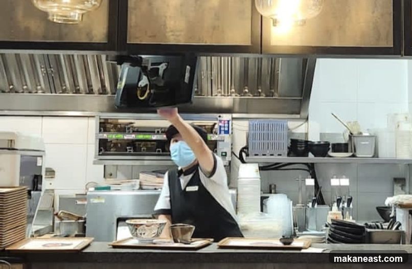 Kitchen Staff Preparing Food