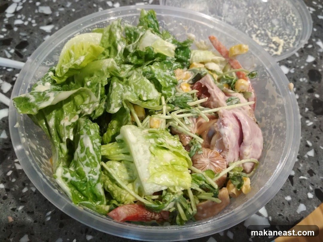 Salad in a plastic container