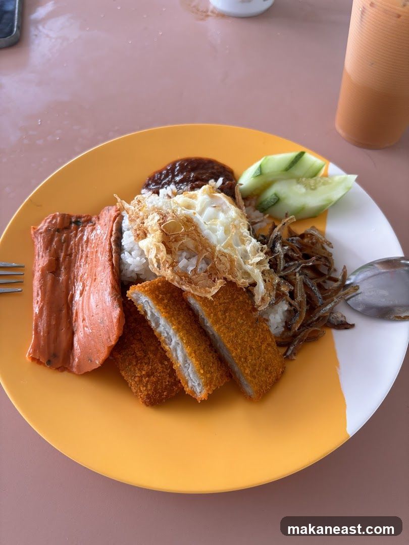 Nasi Lemak with Fried Fish and Chicken