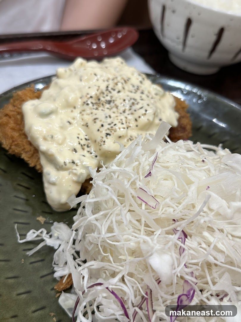 Fried Cutlet with Sauce and Shredded Cabbage