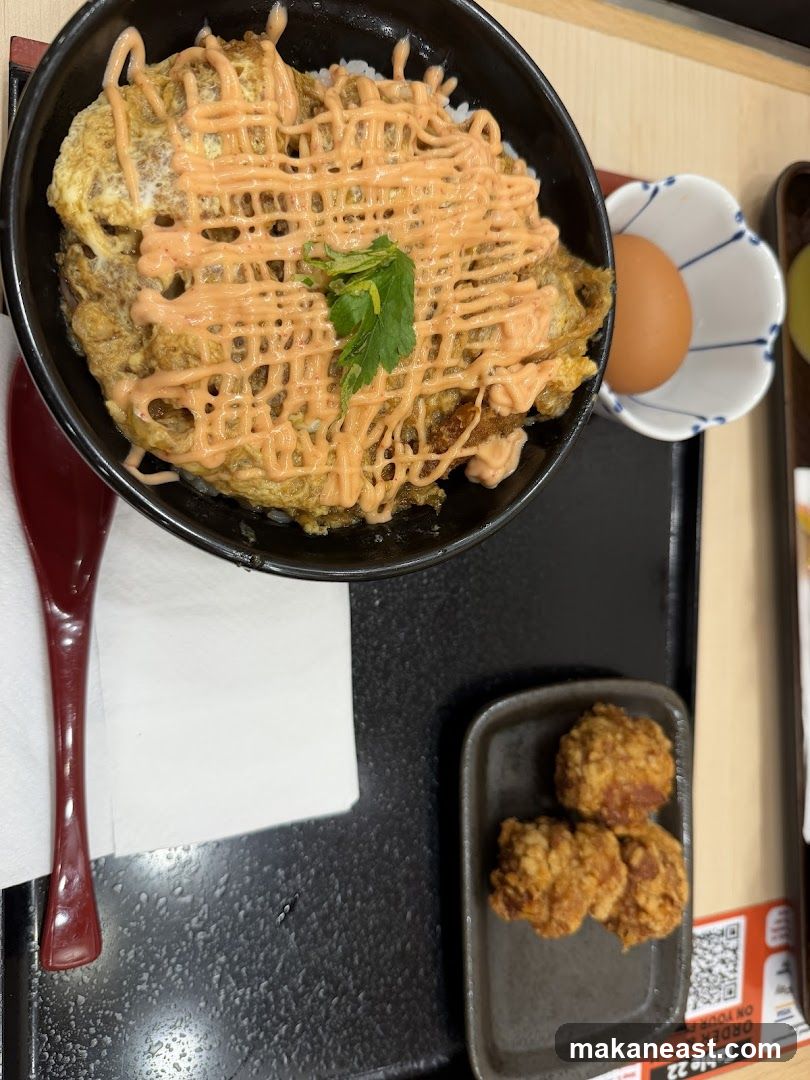 Japanese Rice Bowl with Fried Chicken and Egg