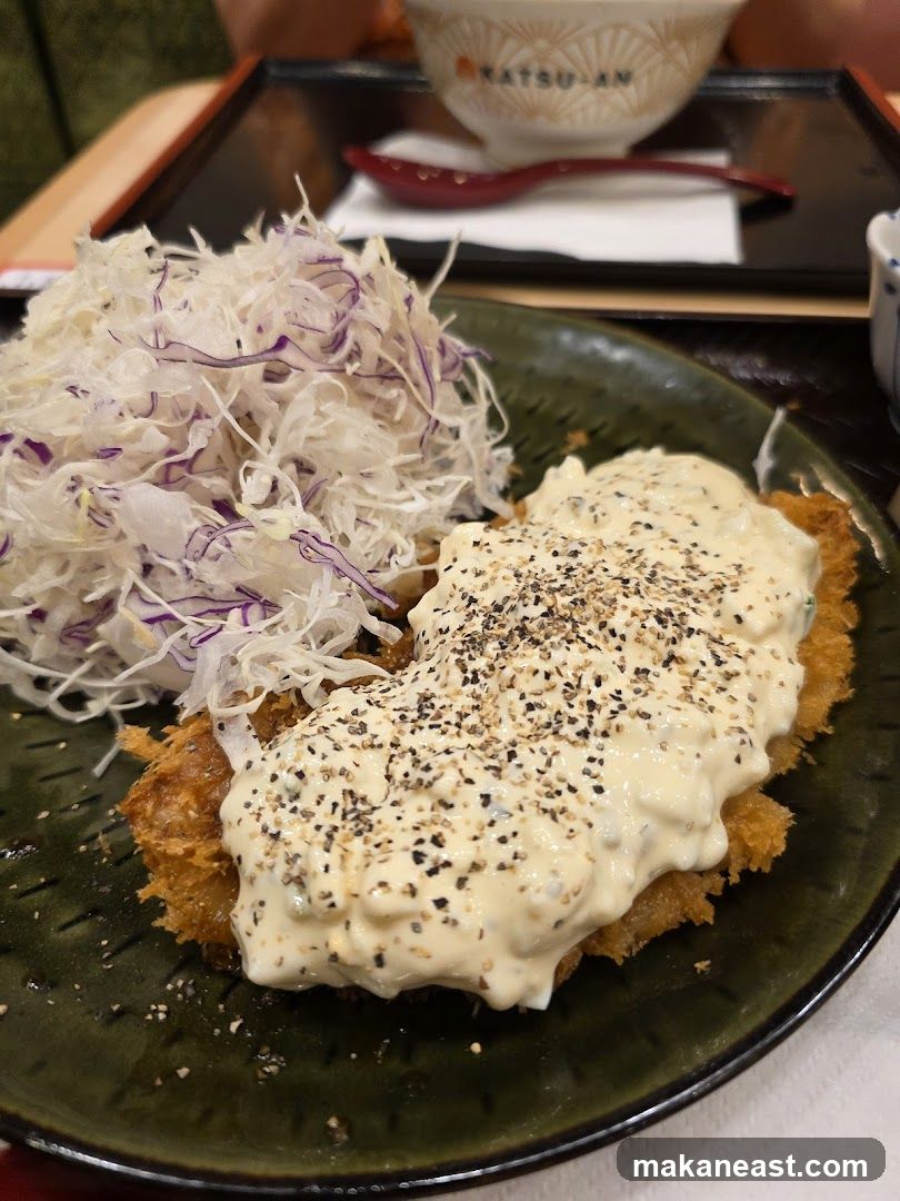 Fried cutlet with tartar sauce and shredded cabbage
