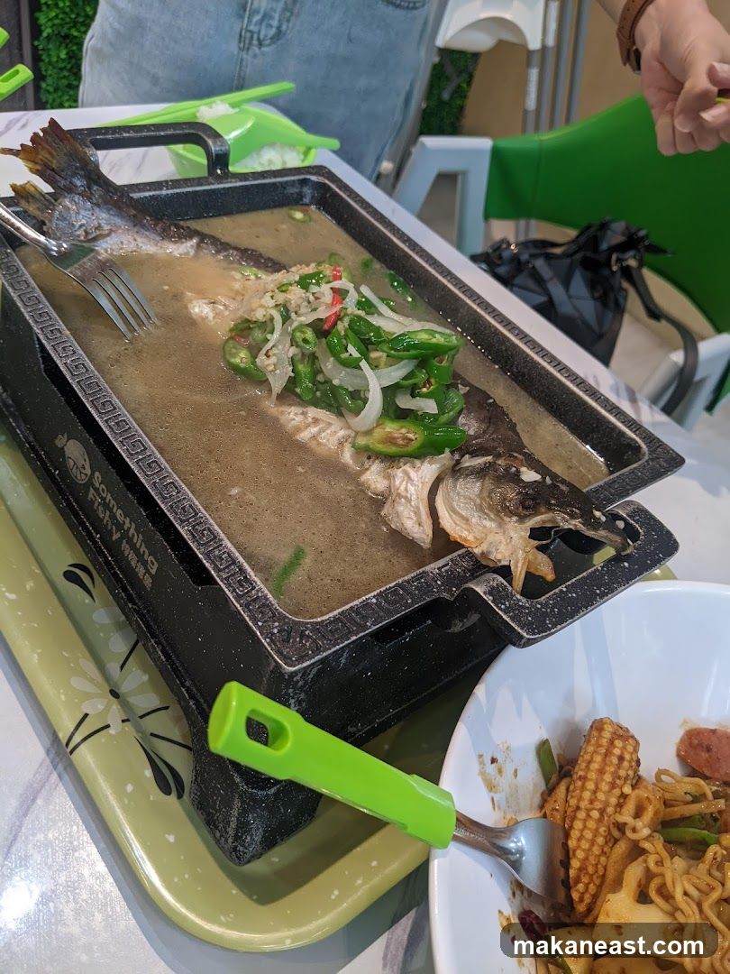 Fish dish with vegetables and noodles
