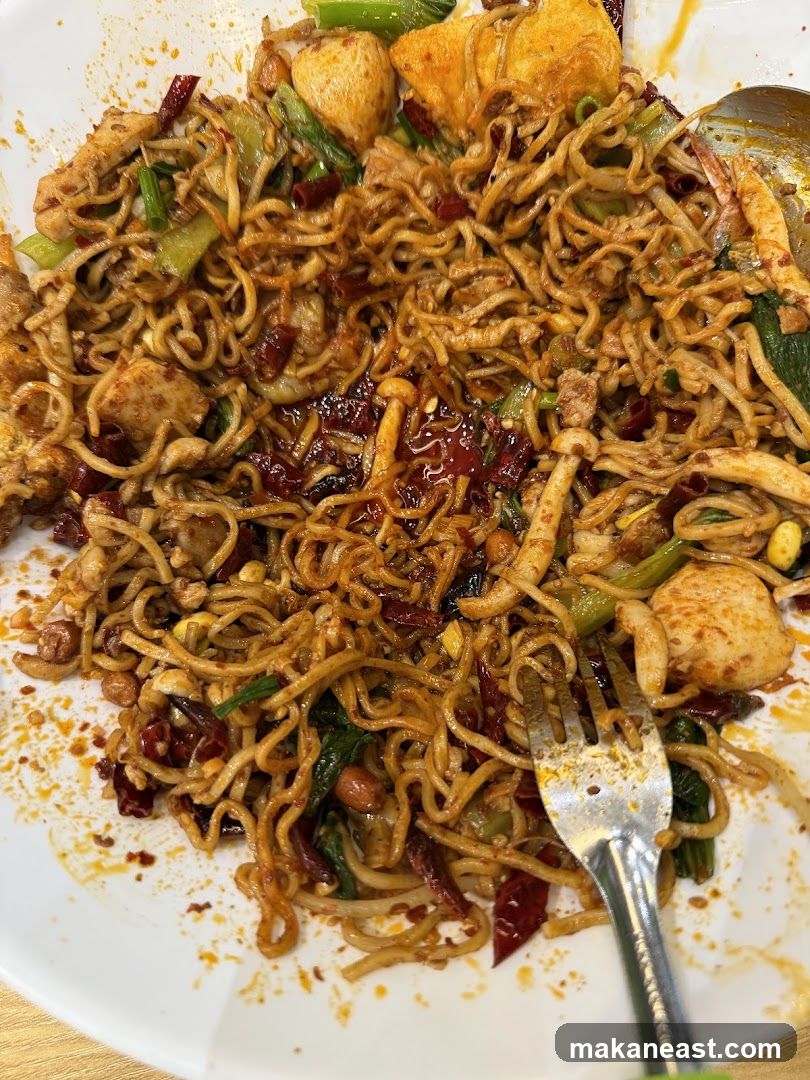 Spicy Noodles with Various Ingredients
