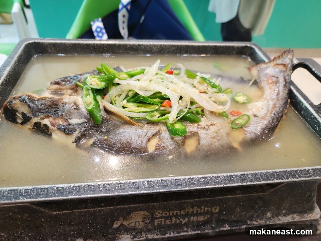 Steamed Fish with Peppers and Onions