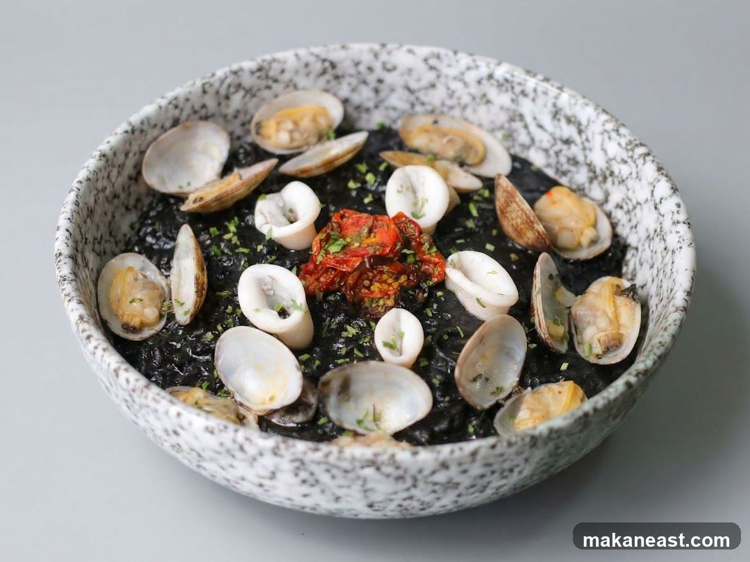 Squid Ink Pasta with Clams and Sun-Dried Tomatoes