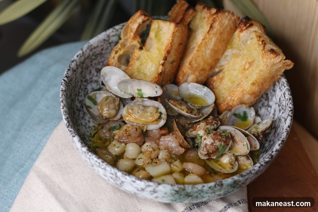 Seafood Dish with Toasted Bread