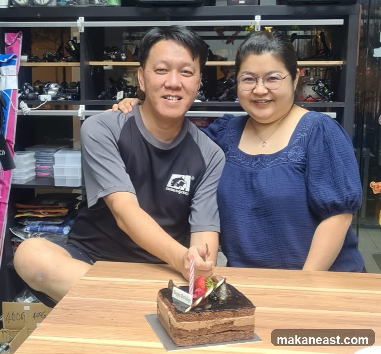 Couple celebrating with a birthday cake