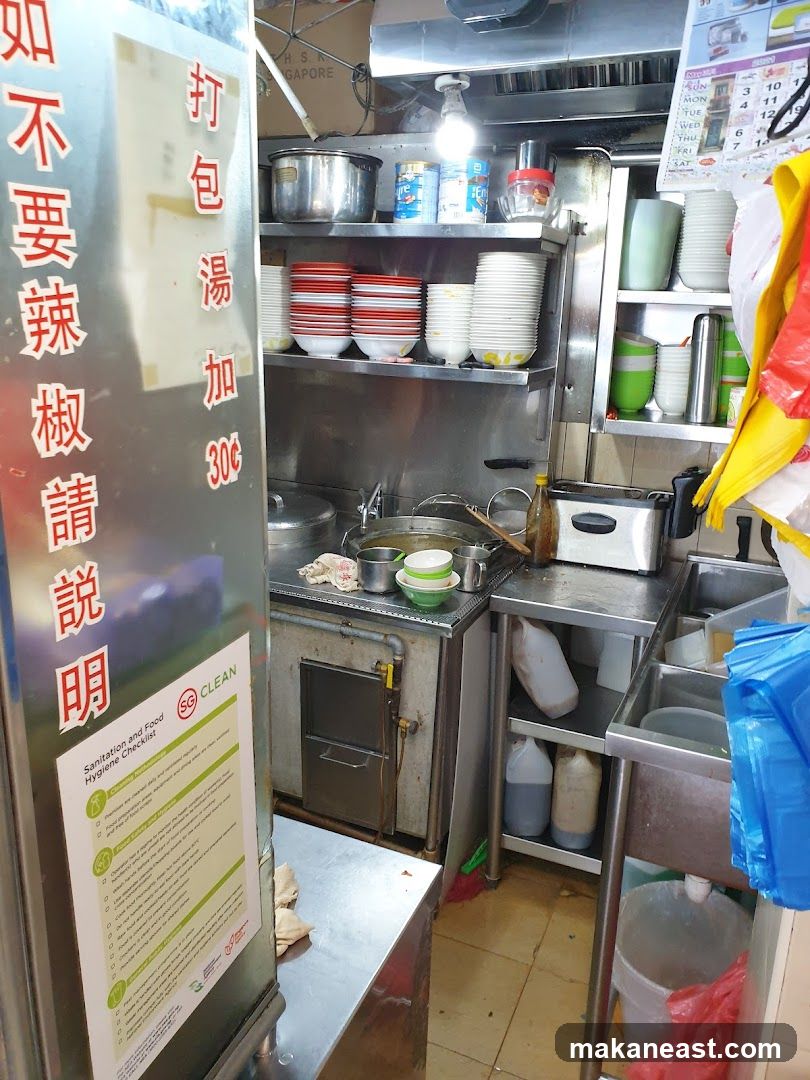 Kitchenette with stacked bowls and containers
