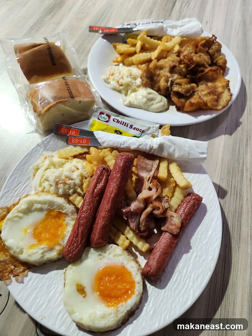Two plates of breakfast food