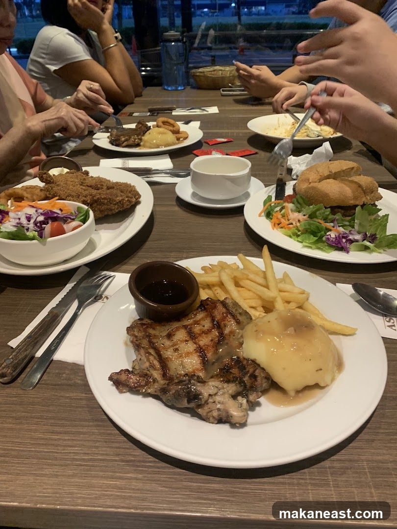 Diners Enjoying Meals at a Table