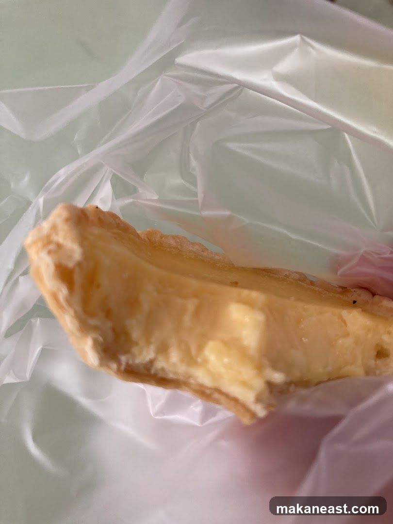 Close-up of a slice of tart in plastic packaging