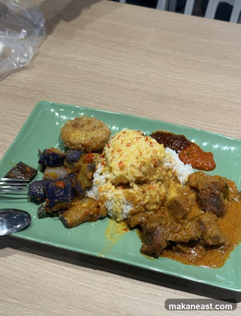 Plate of food with rice and curry
