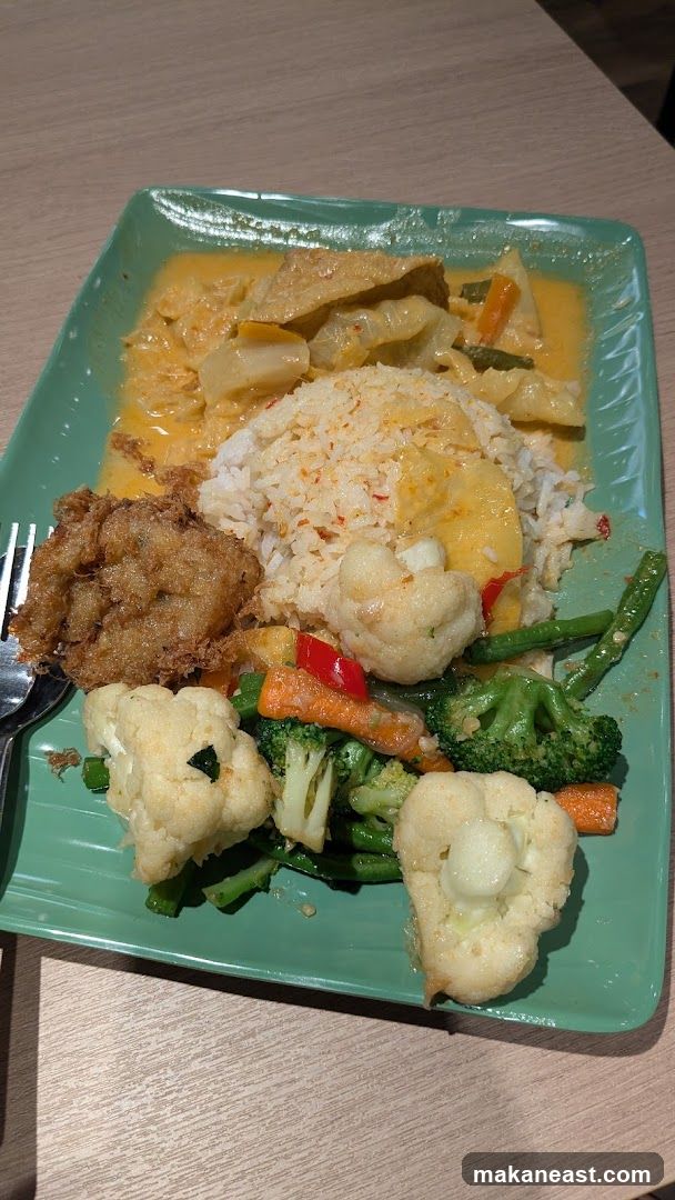 Plate of food with rice and vegetables