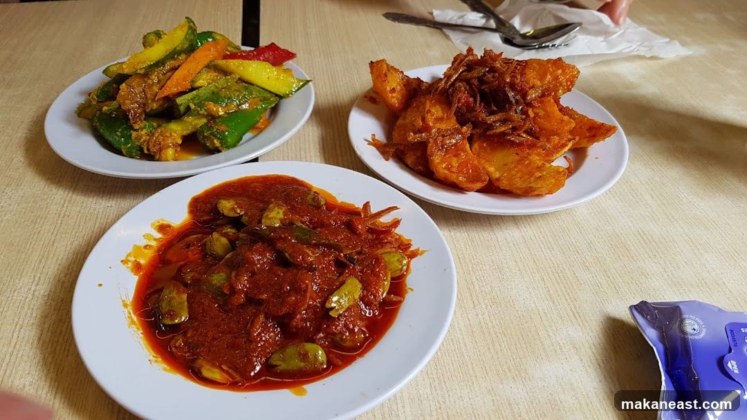 Three plates of food on a table