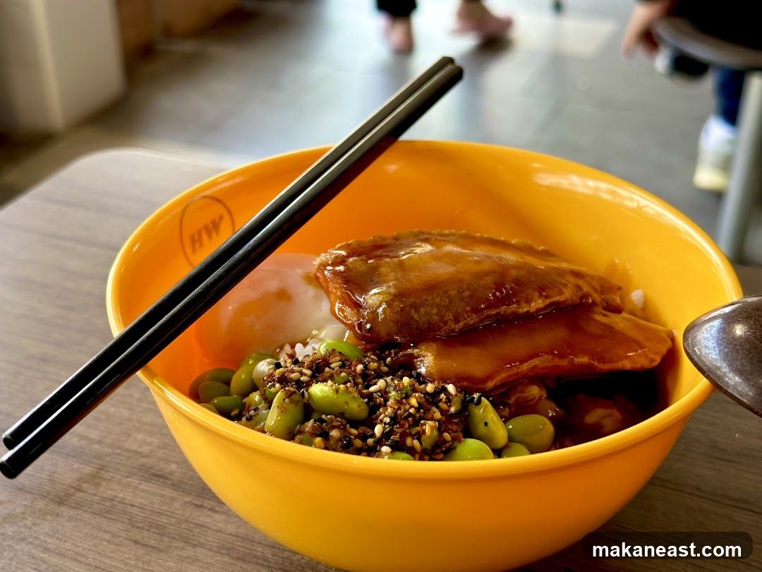 Bowl of food with chopsticks