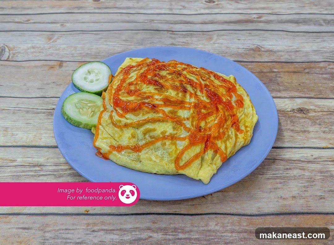 Omelette with Chili Sauce and Cucumber Slices