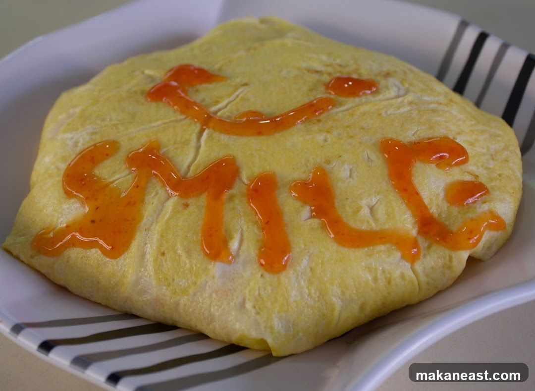 Omurice with "Smile" written in sauce