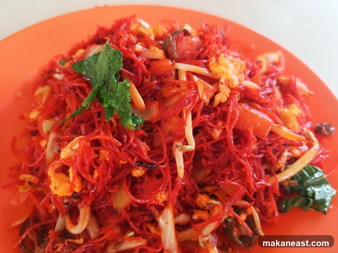 Red Noodles with Vegetables and Egg