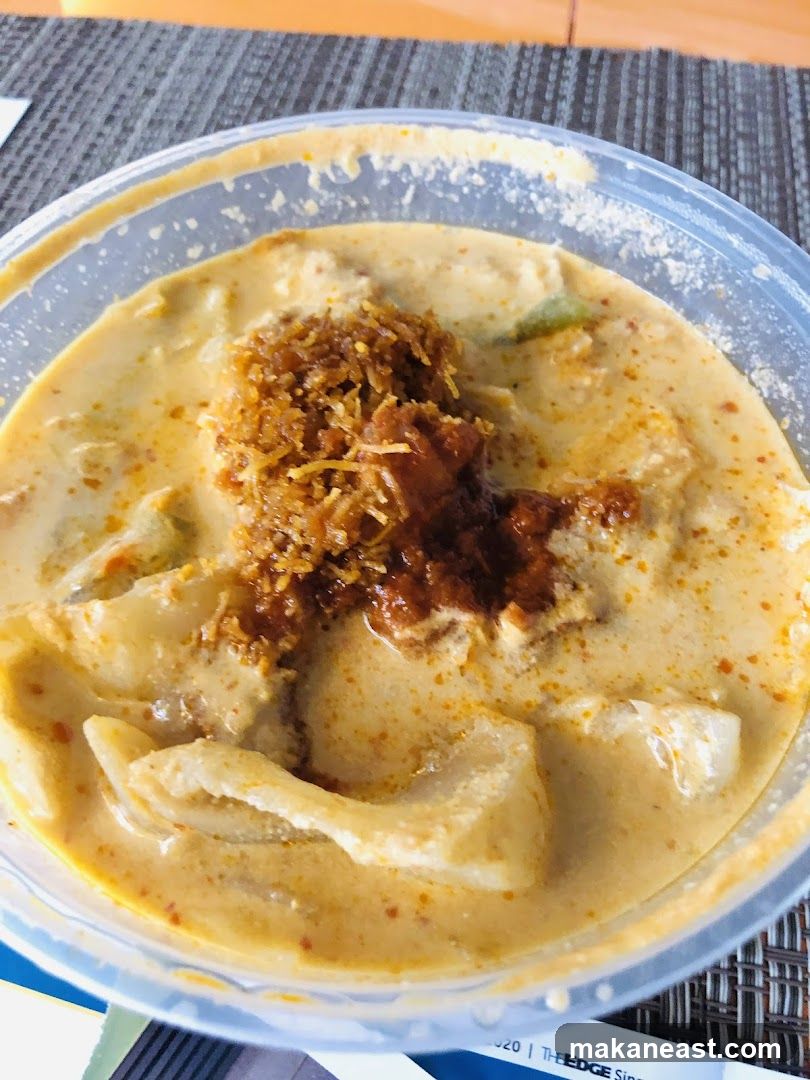 Laksa in a clear plastic container