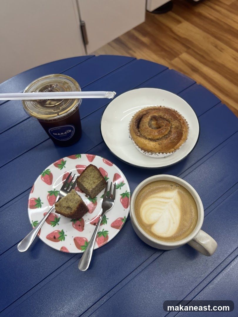 Coffee and pastries on a blue table