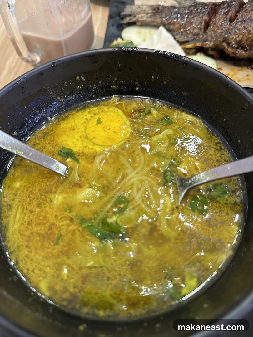 Noodle Soup with Egg and Fried Fish