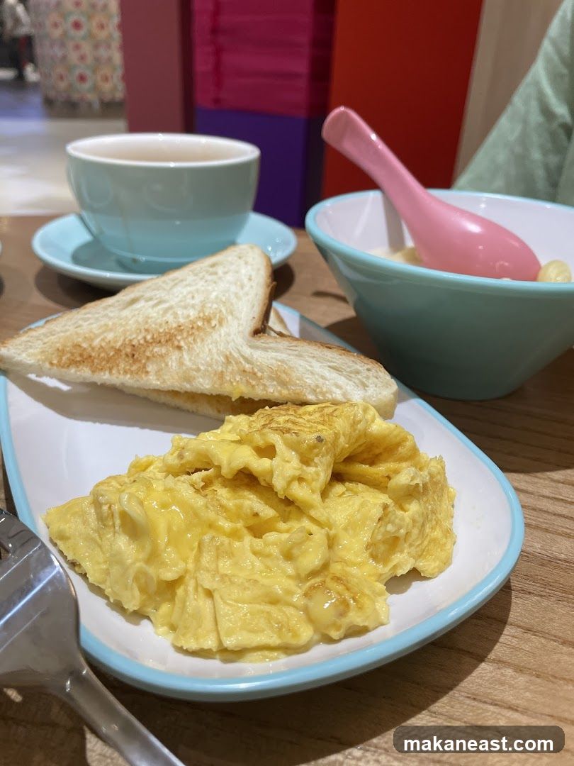 Scrambled eggs and toast breakfast