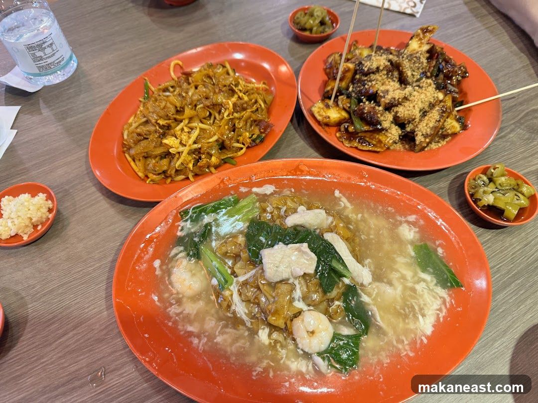 Three Plates of Noodles and Appetizers