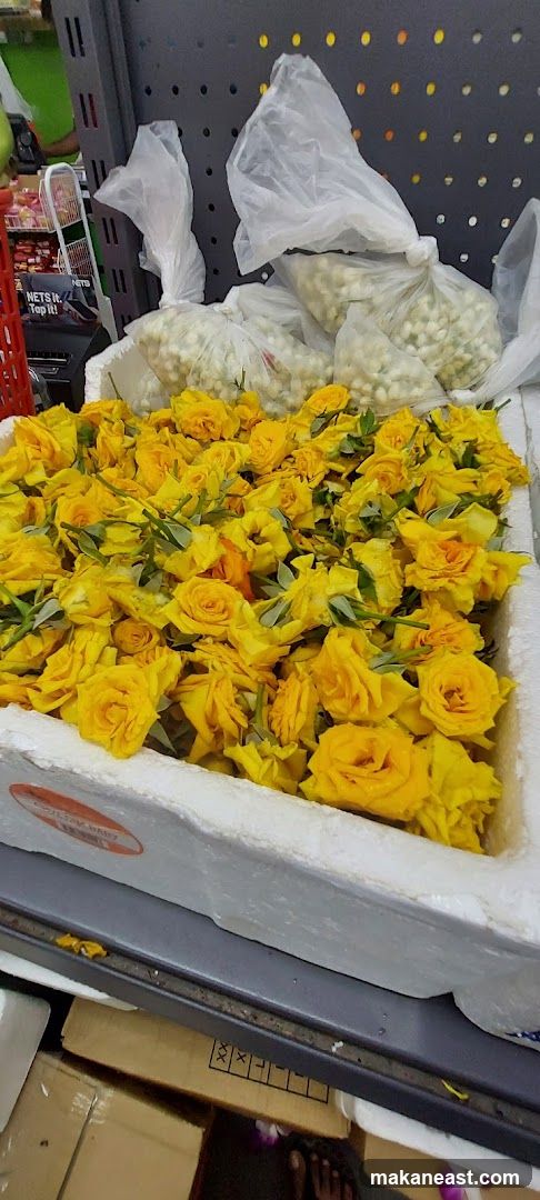 Yellow Roses and White Flowers