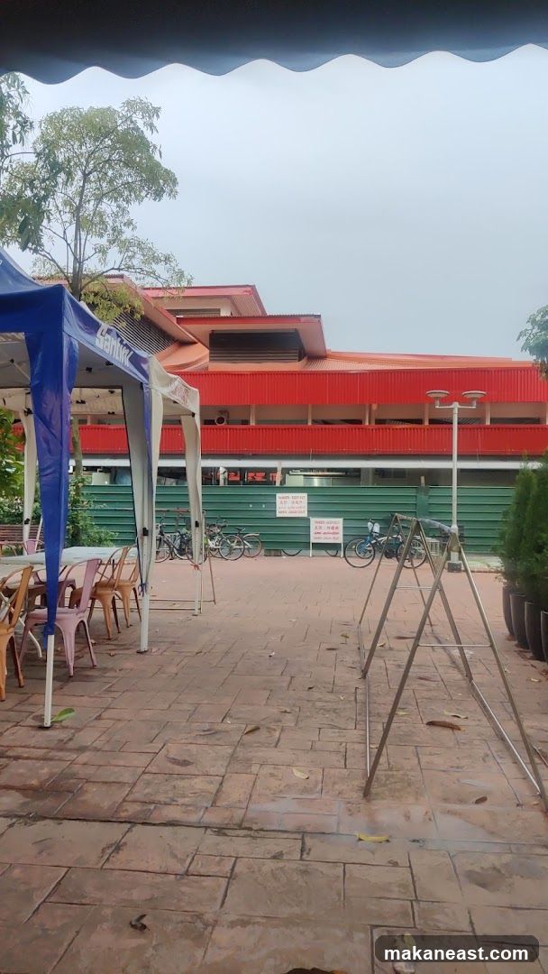 Outdoor Seating Area with Building in Background
