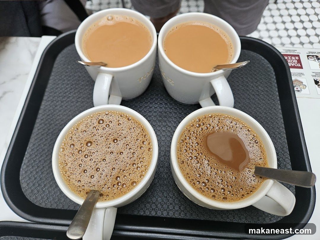 Four Cups of Coffee on a Tray