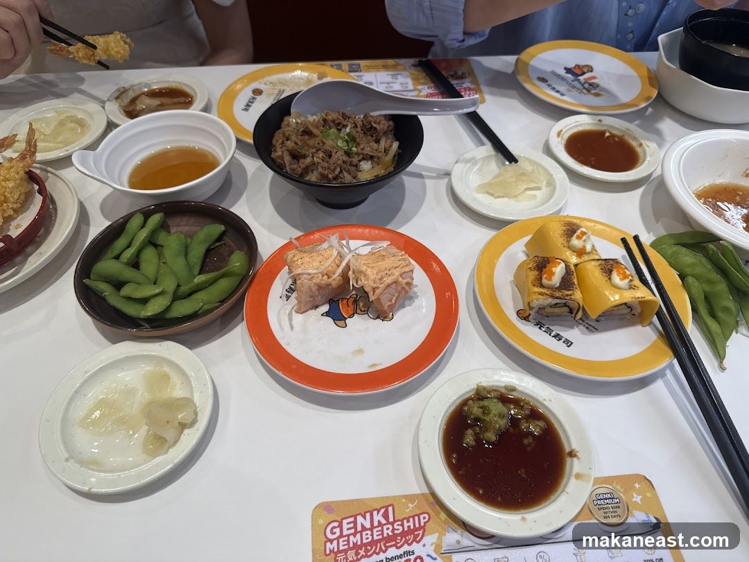 Table with Sushi and Other Dishes