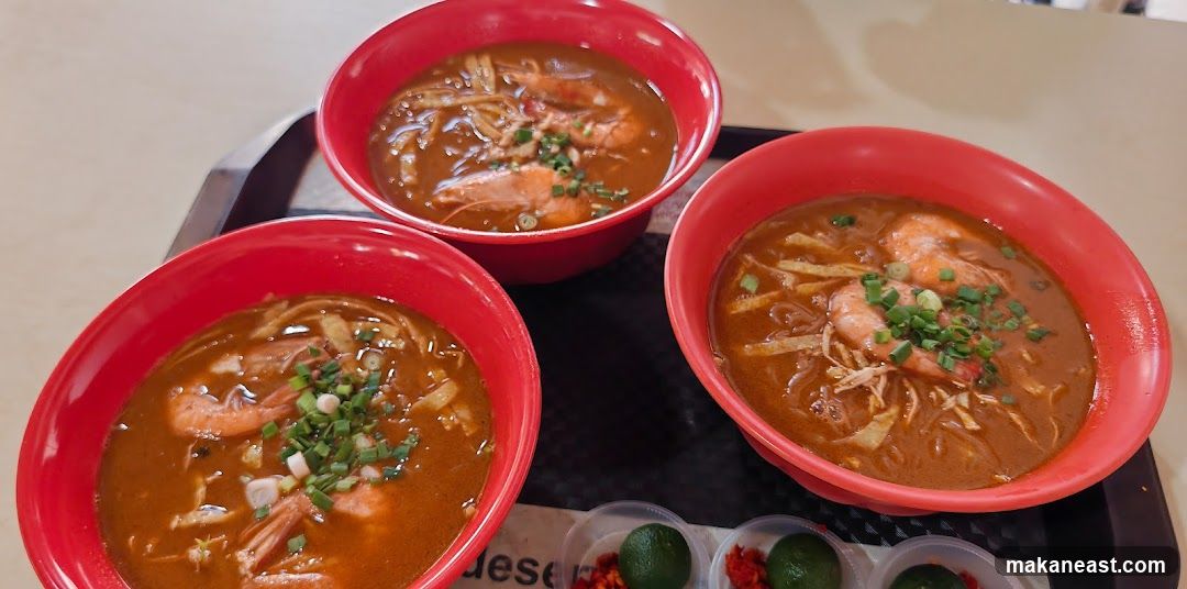 Three bowls of prawn noodle soup