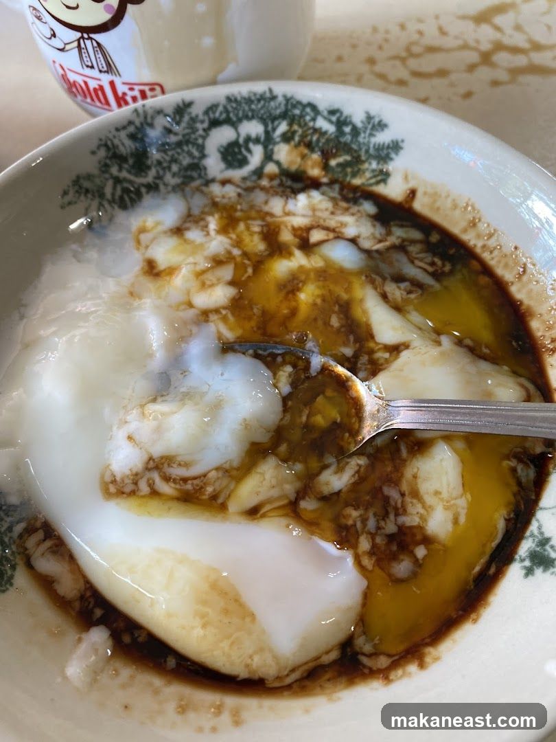 Soft-boiled eggs with soy sauce and pepper