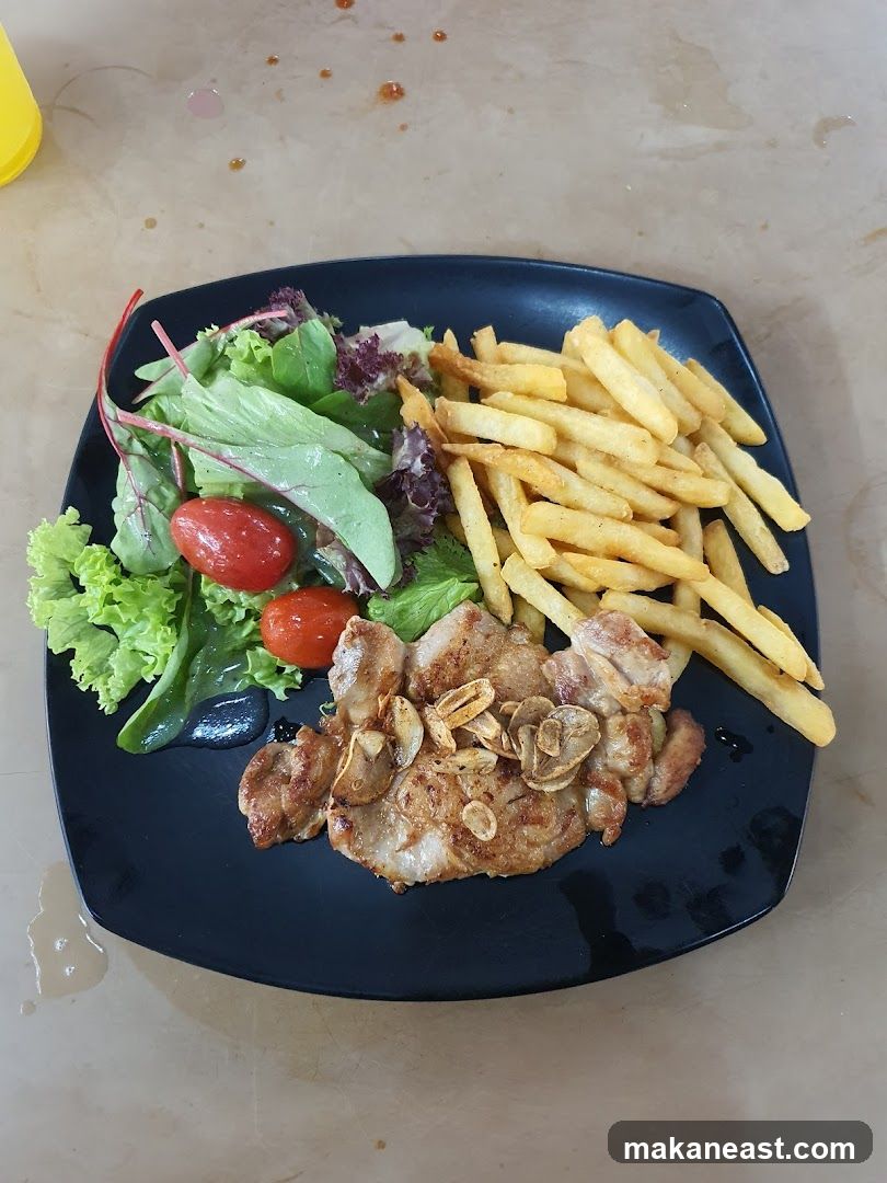 Pork Chop with Fries and Salad
