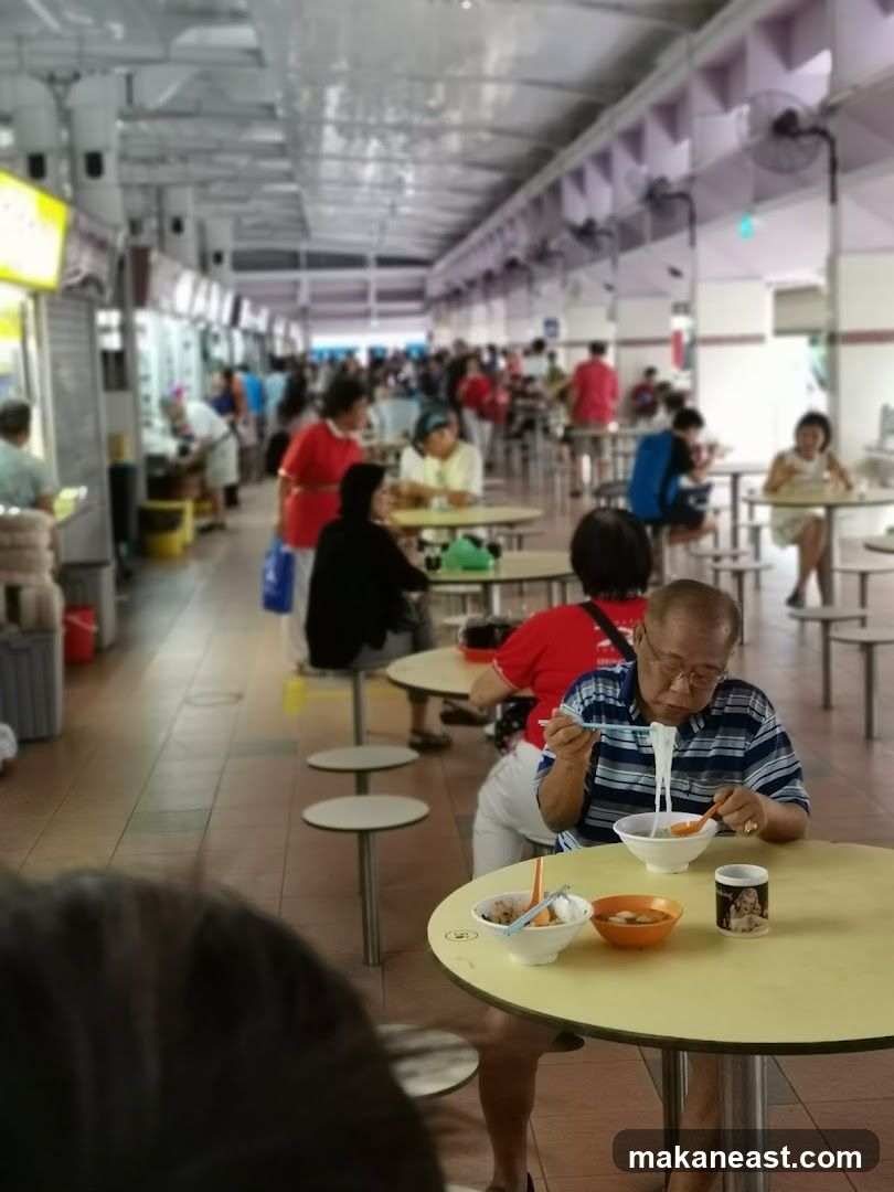 People eating at a food court