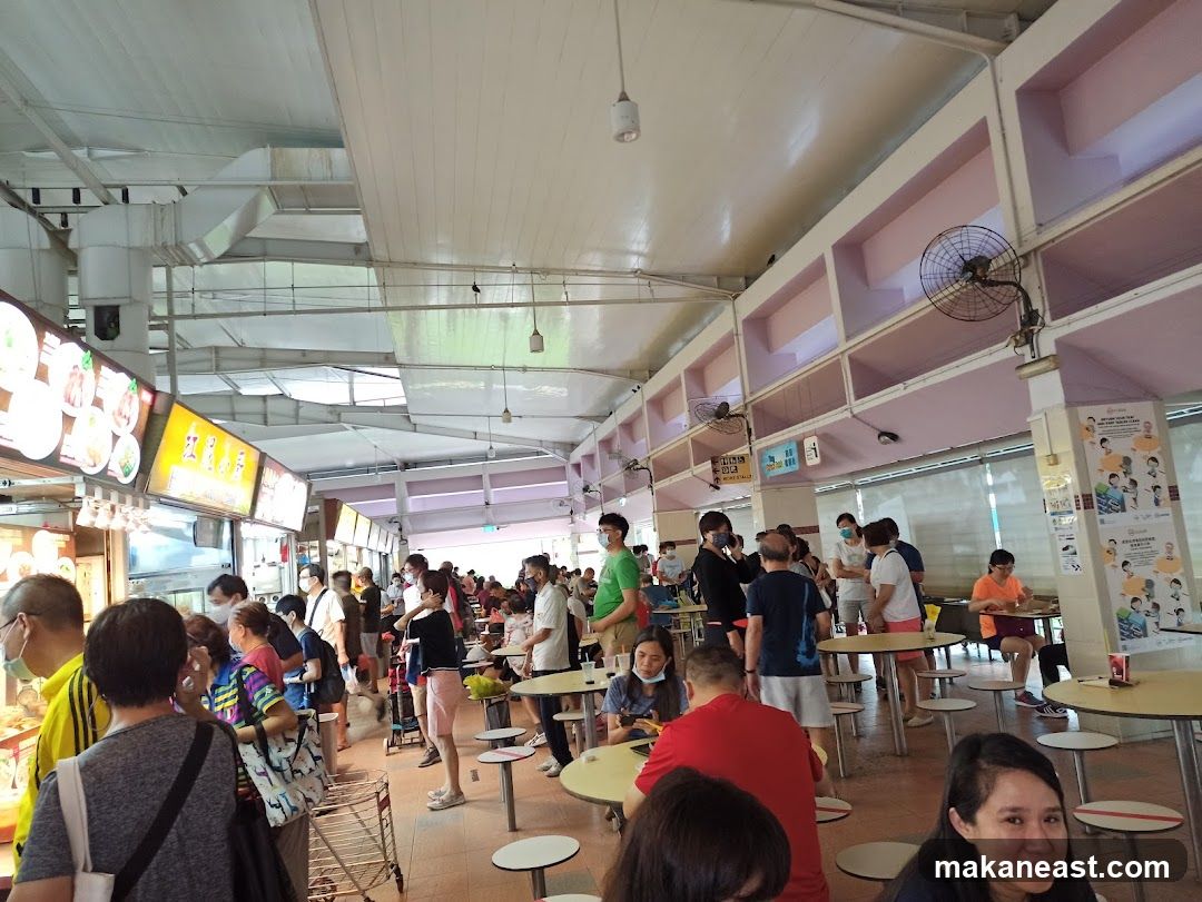 Busy food court with diners