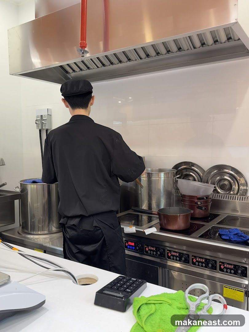 Chef Cooking in Kitchen