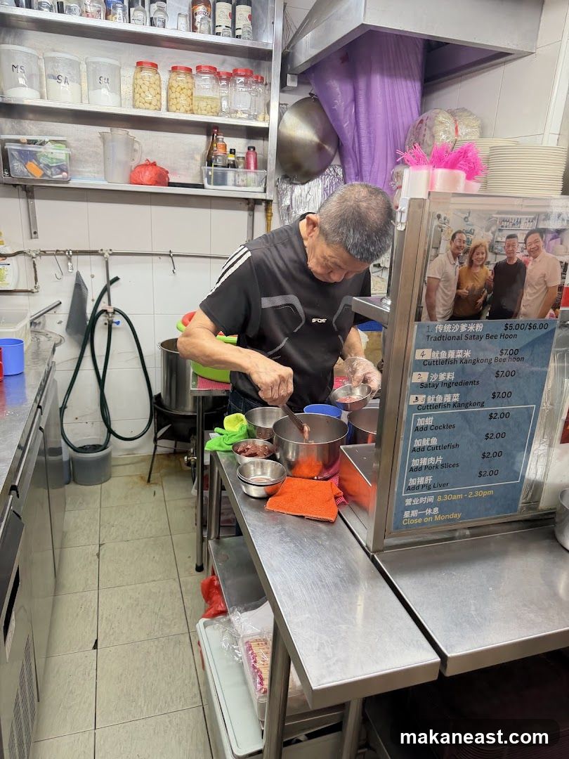Man preparing food at a stall