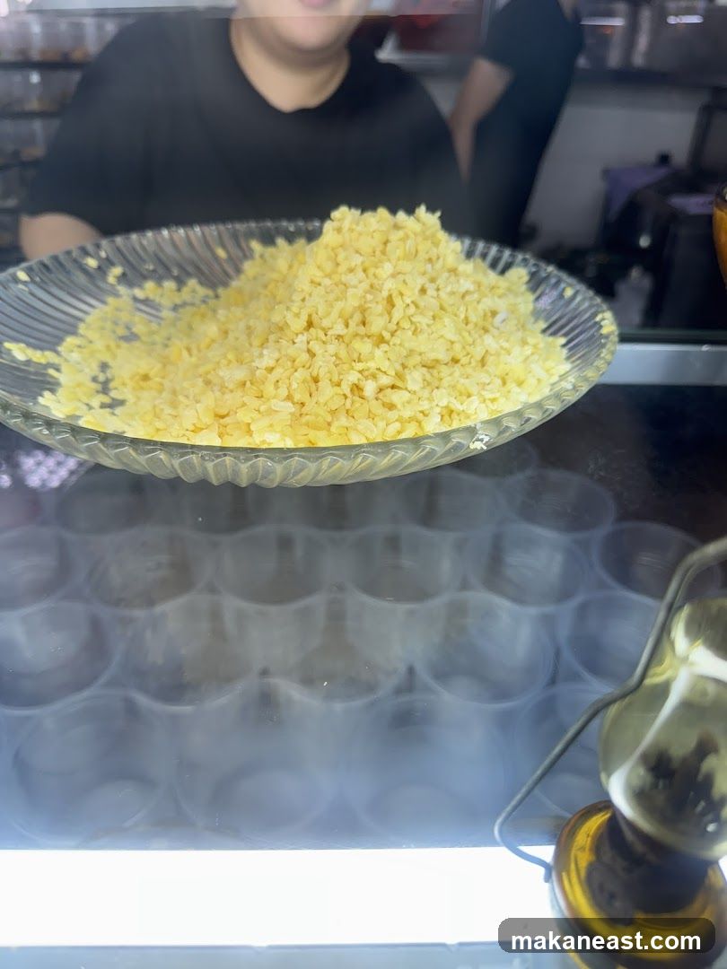 Pile of yellow food on a plate